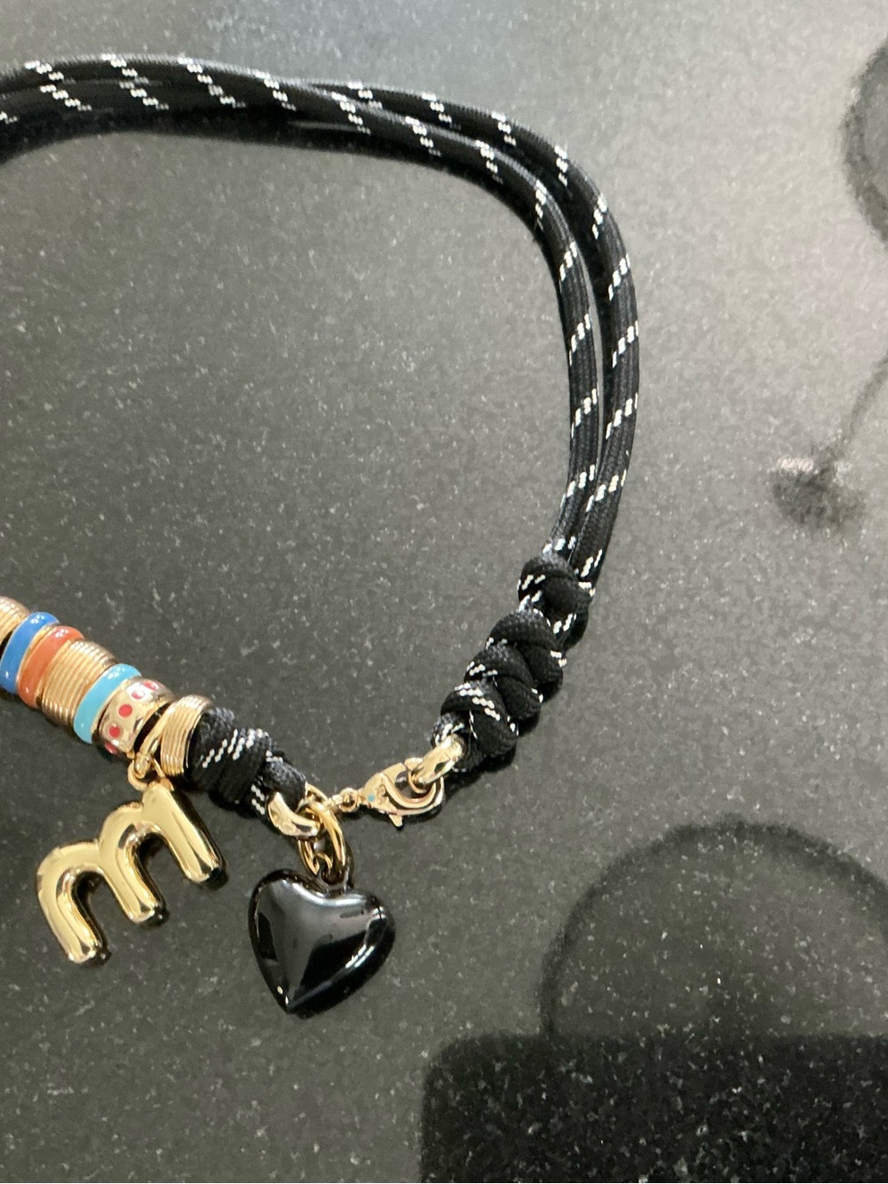 Roxanne Assoulin The Super Size Happy Cord Necklace with black puffy heart & “m” - Picture 2 of 4